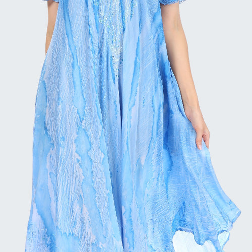 Woman wearing a light blue dress with short sleeves on a white background