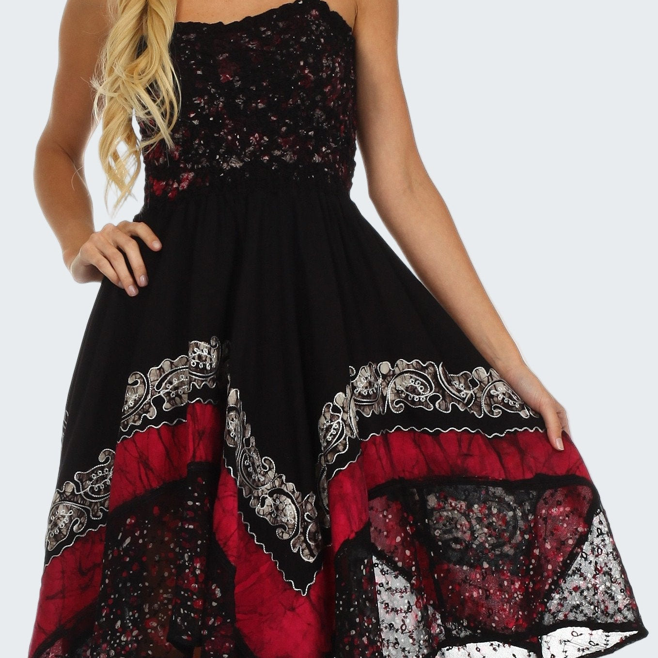 Black dress with red and white patterns on a white background