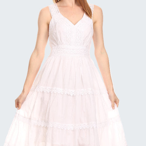 White dress with lace details on a white background
