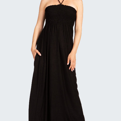 Black halter neck dress worn by a model on a white background