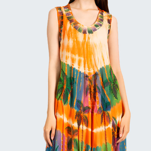 Woman wearing a colorful tie-dye dress on a white background