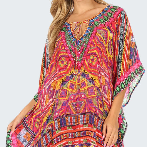 Colorful patterned dress with a white background