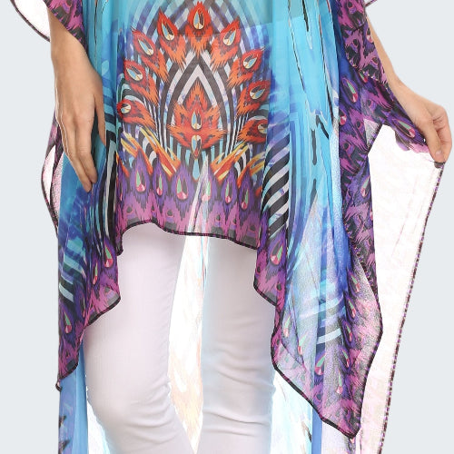 Colorful patterned dress with white pants on a white background