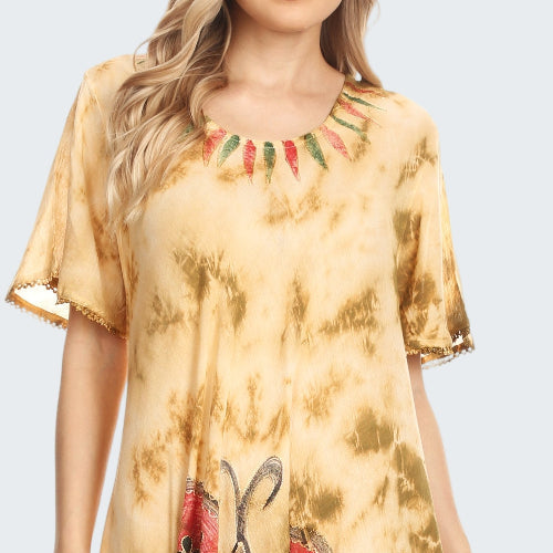 Woman wearing a tie-dye dress with floral patterns on a beige background