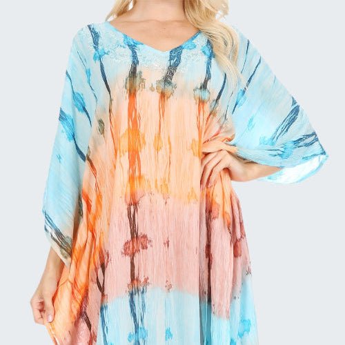 Colorful tie-dye dress with a pattern on a white background