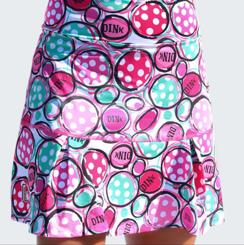 Skirt with colorful polka dot pattern and 'Dink' text on a white background