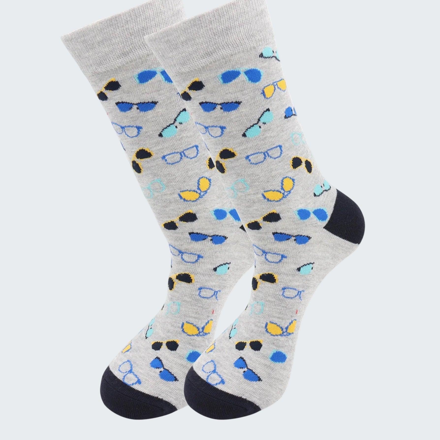 Gray socks with blue, yellow, and black sunglasses pattern on a white background