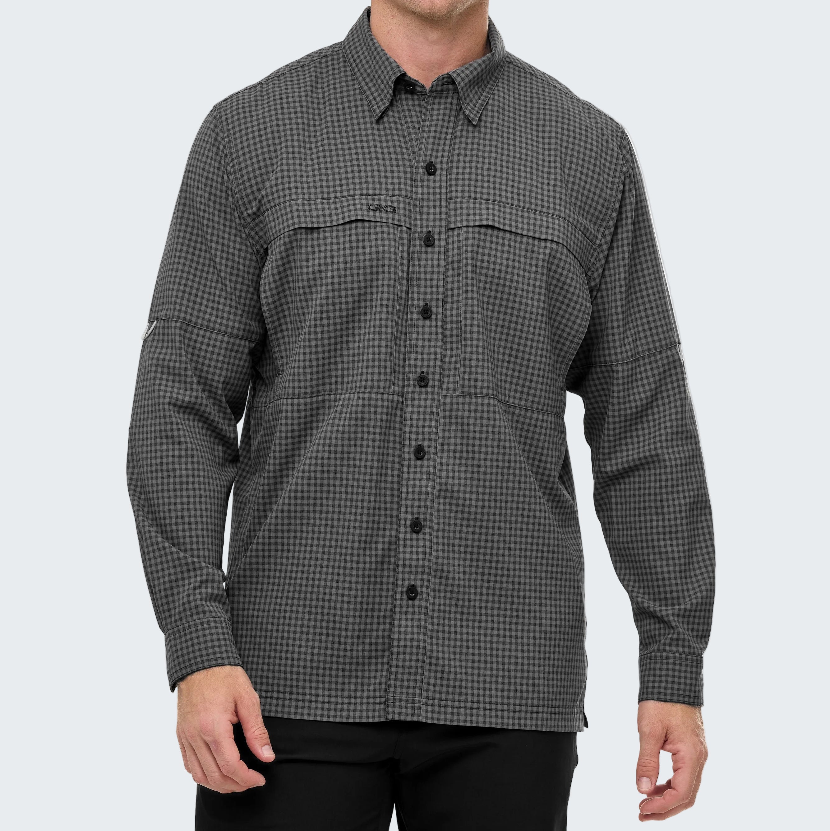 Gray checkered shirt worn by a person on a white background