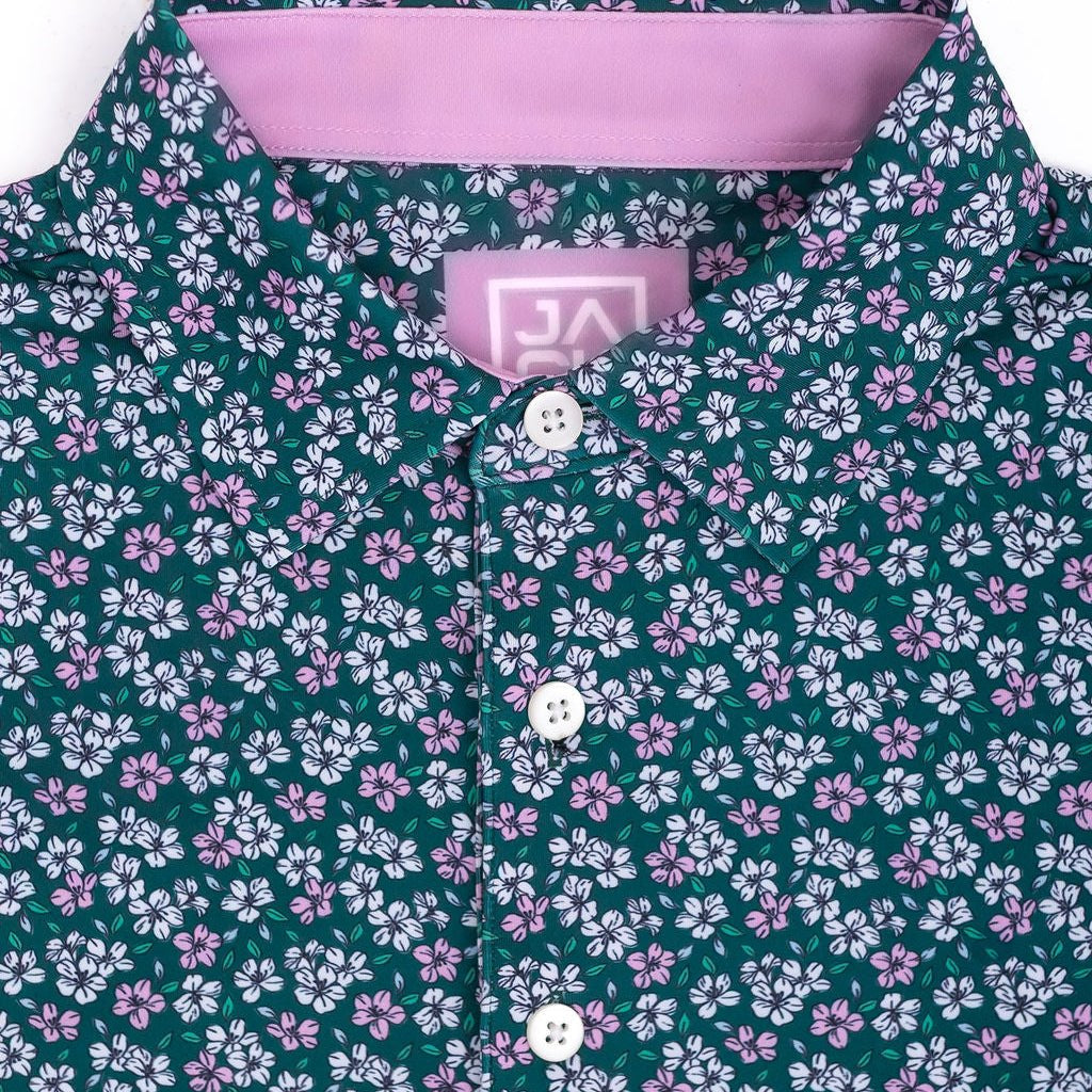 Floral patterned shirt with a pink collar and brand logo on a white background