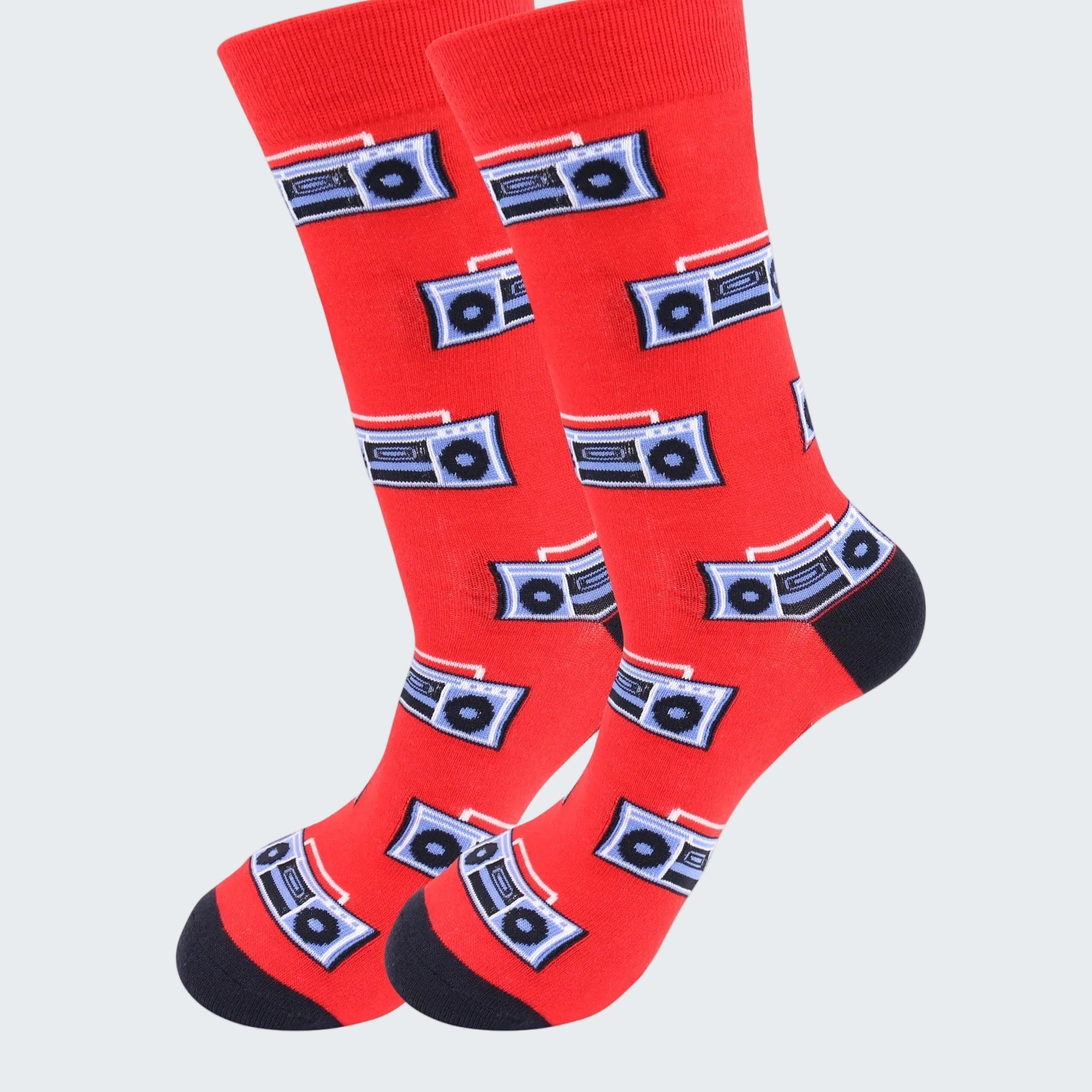 Red socks with cassette tape pattern on a white background