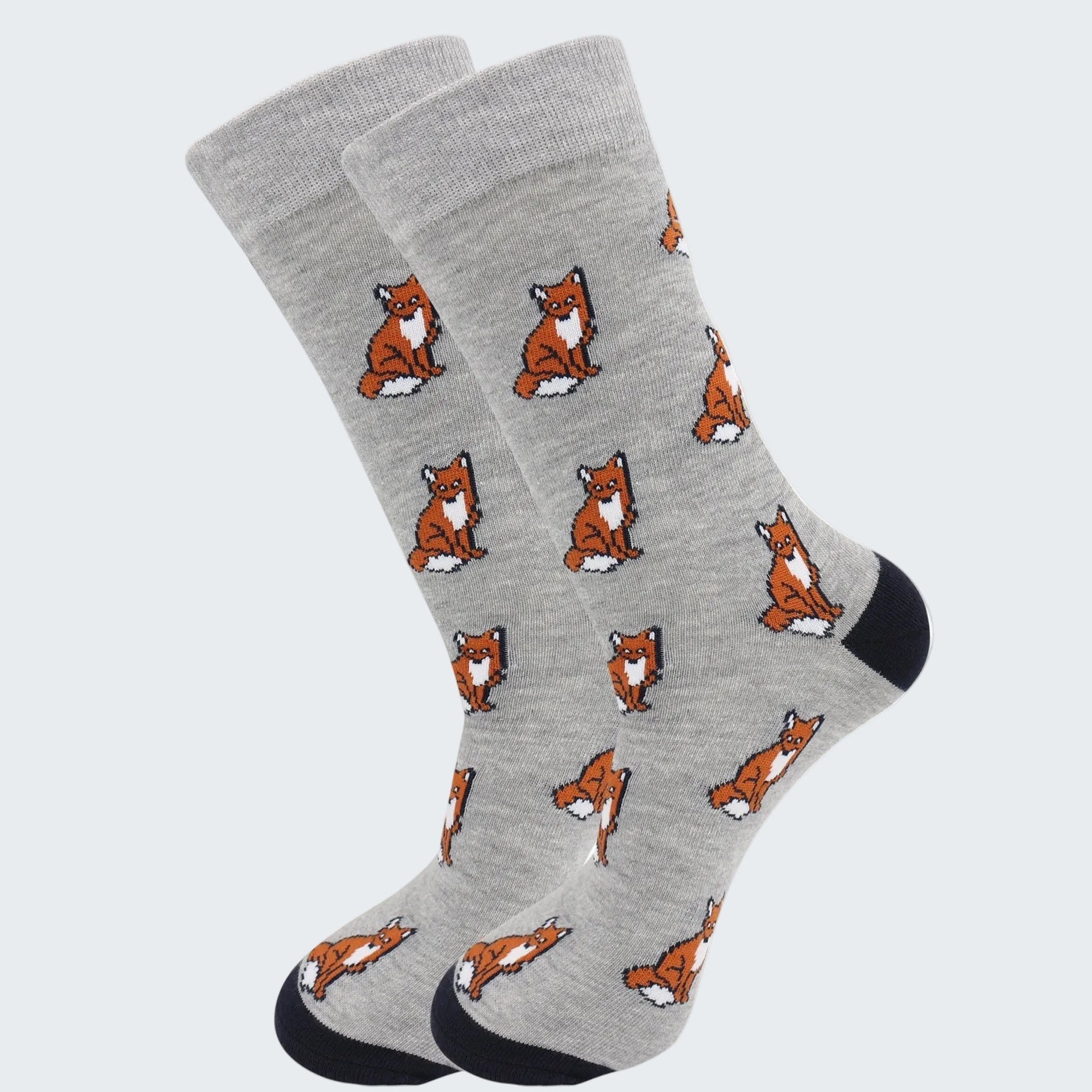 Gray socks with fox pattern on a white background