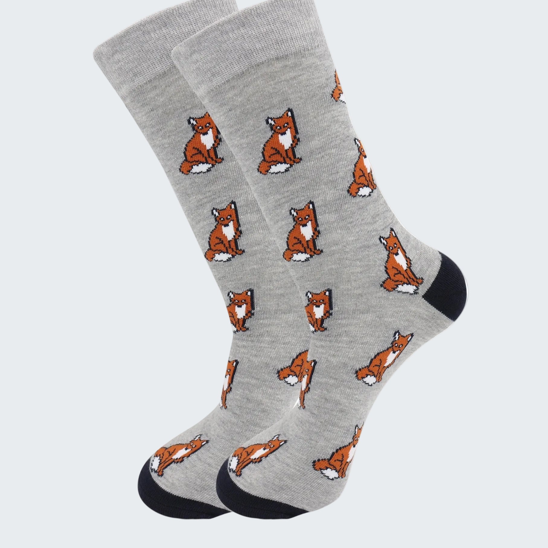 Gray socks with fox pattern on a white background