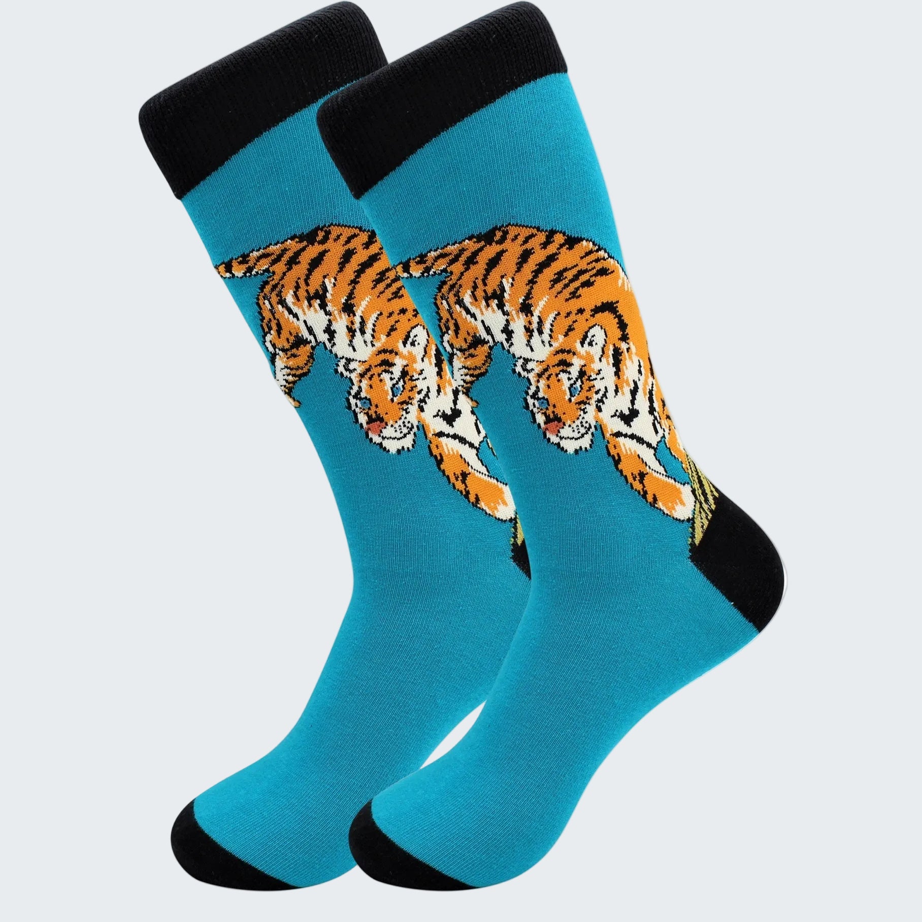 Teal socks with tiger design on a white background