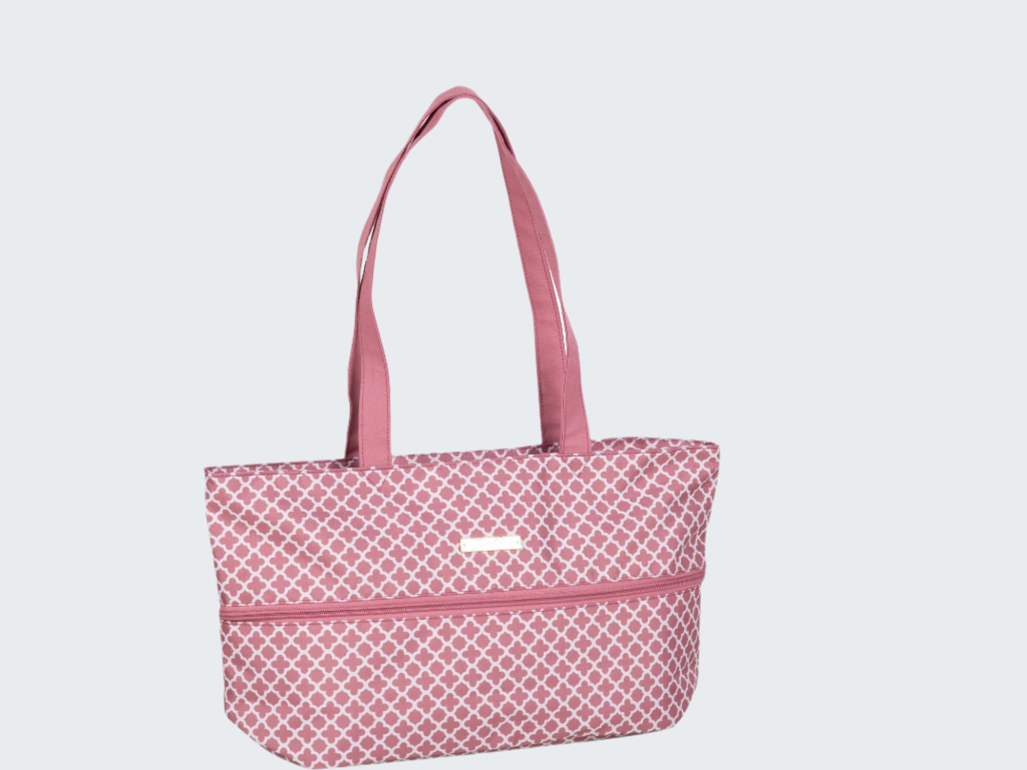 Pink patterned tote bag on a white background