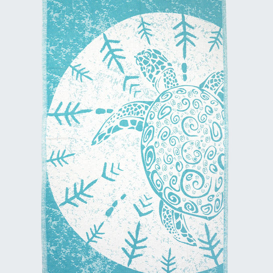 Towel with a turtle design on a blue and white background