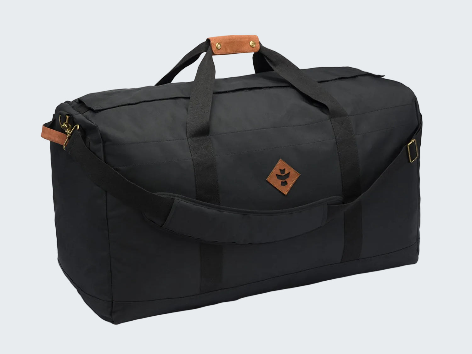 Black duffel bag with brown leather accents on a white background