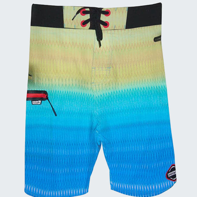 Gradient blue to yellow board shorts with a black and red accent on a white background