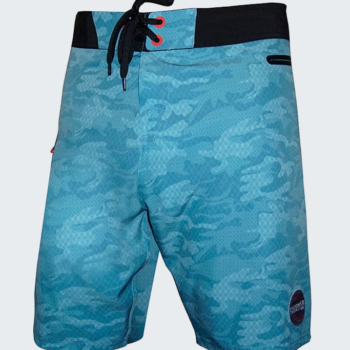 Blue camouflage board shorts with black waistband on a white background