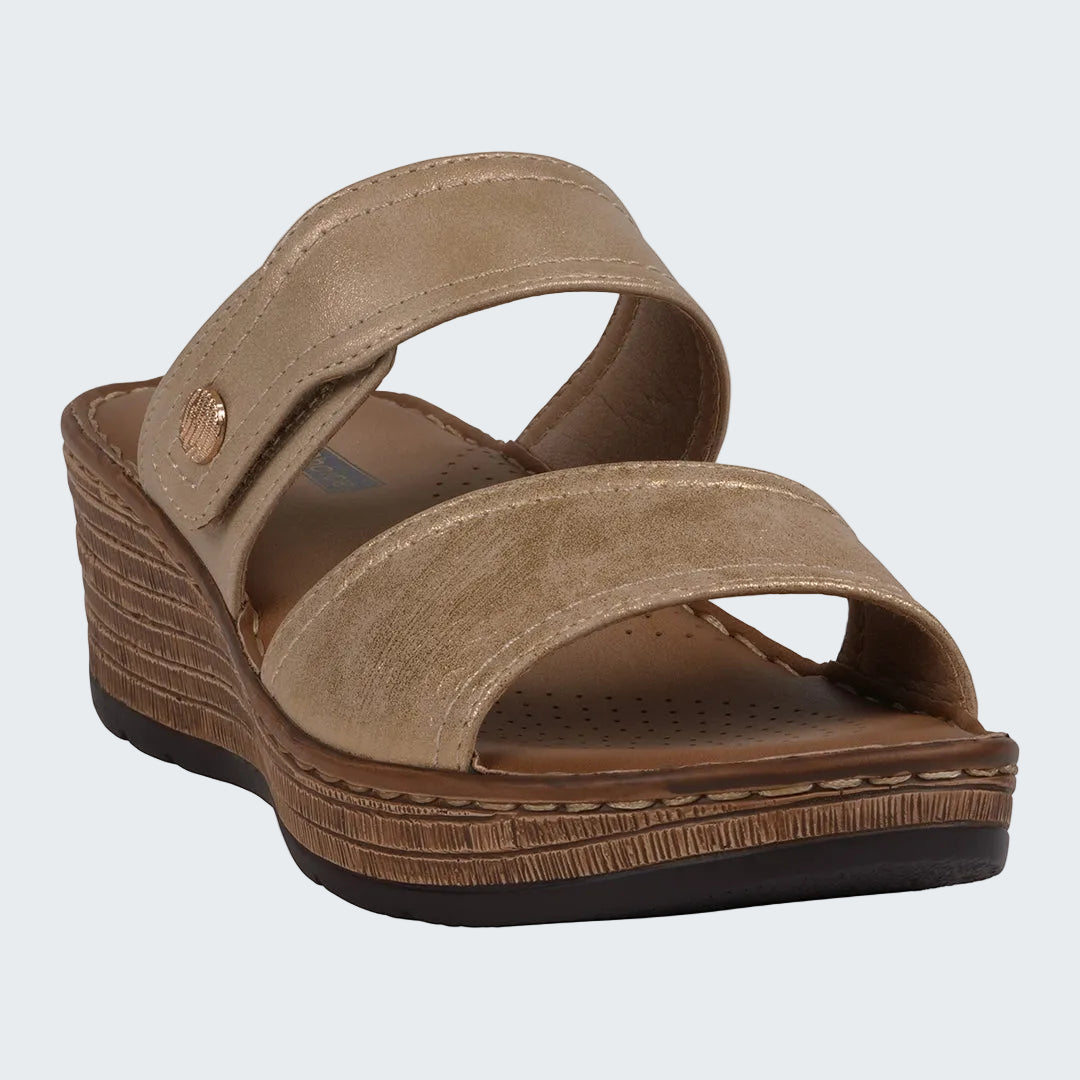 Brown wedge sandal on a white background