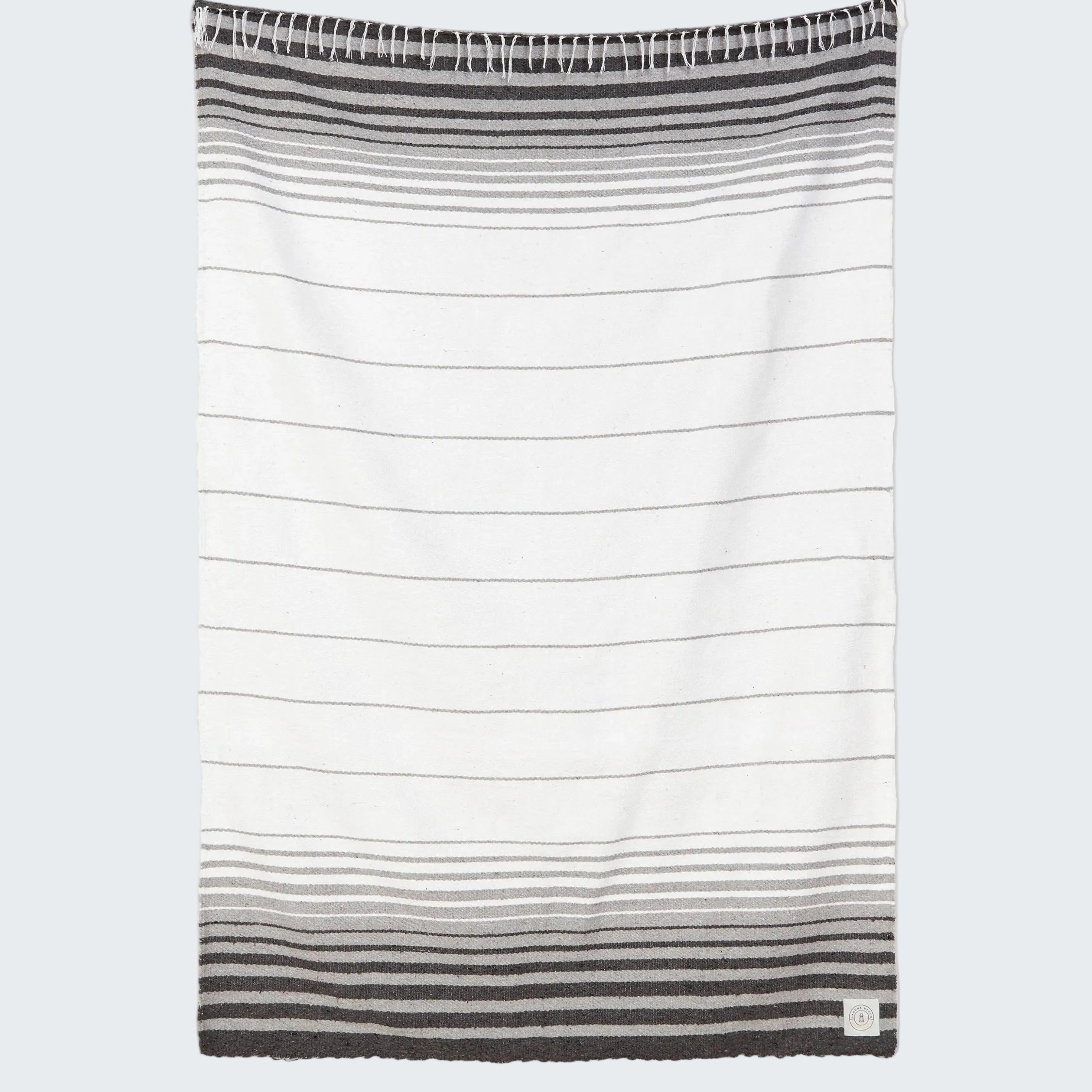 Striped towel with gradient design on a white background