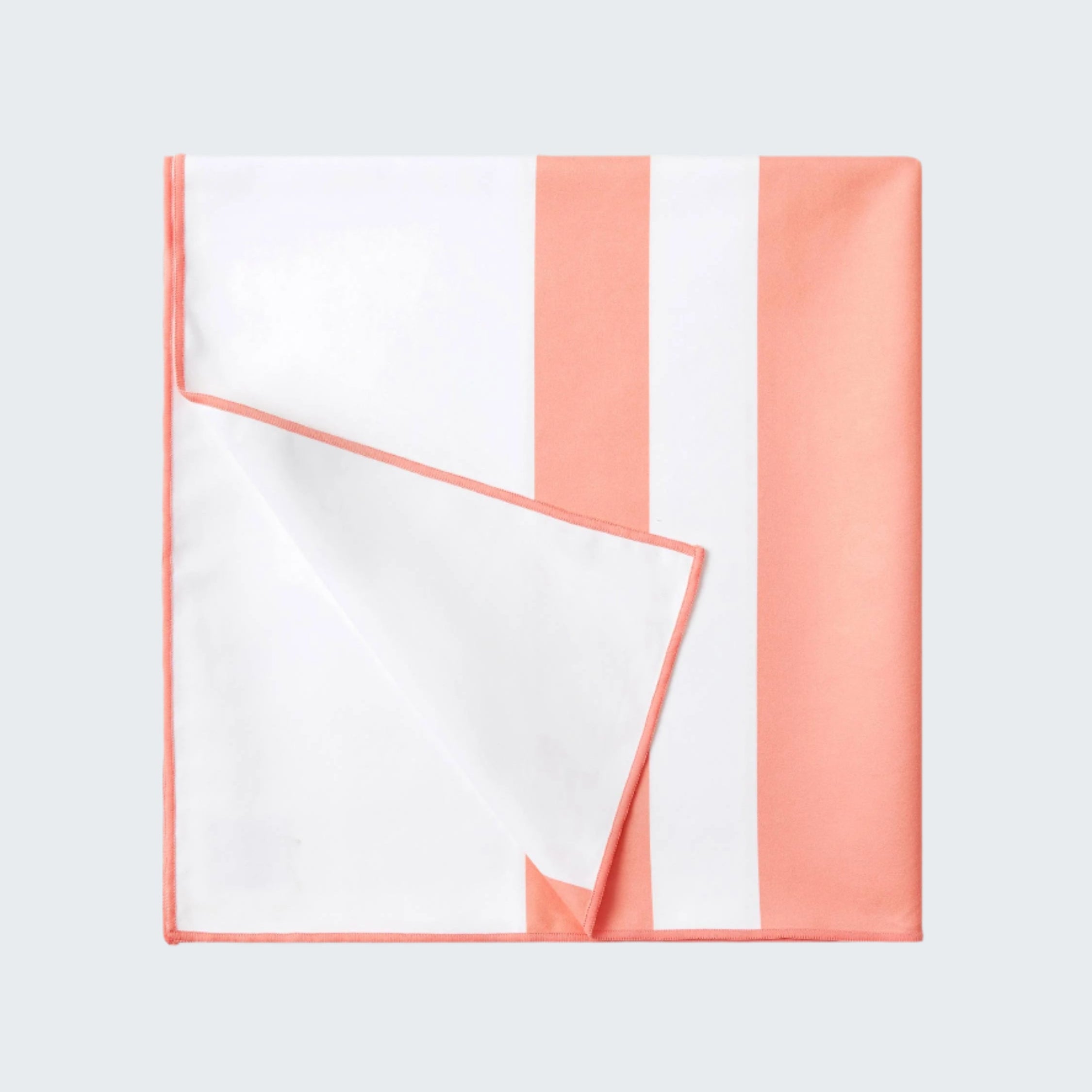 Coral and white striped fabric on a white background