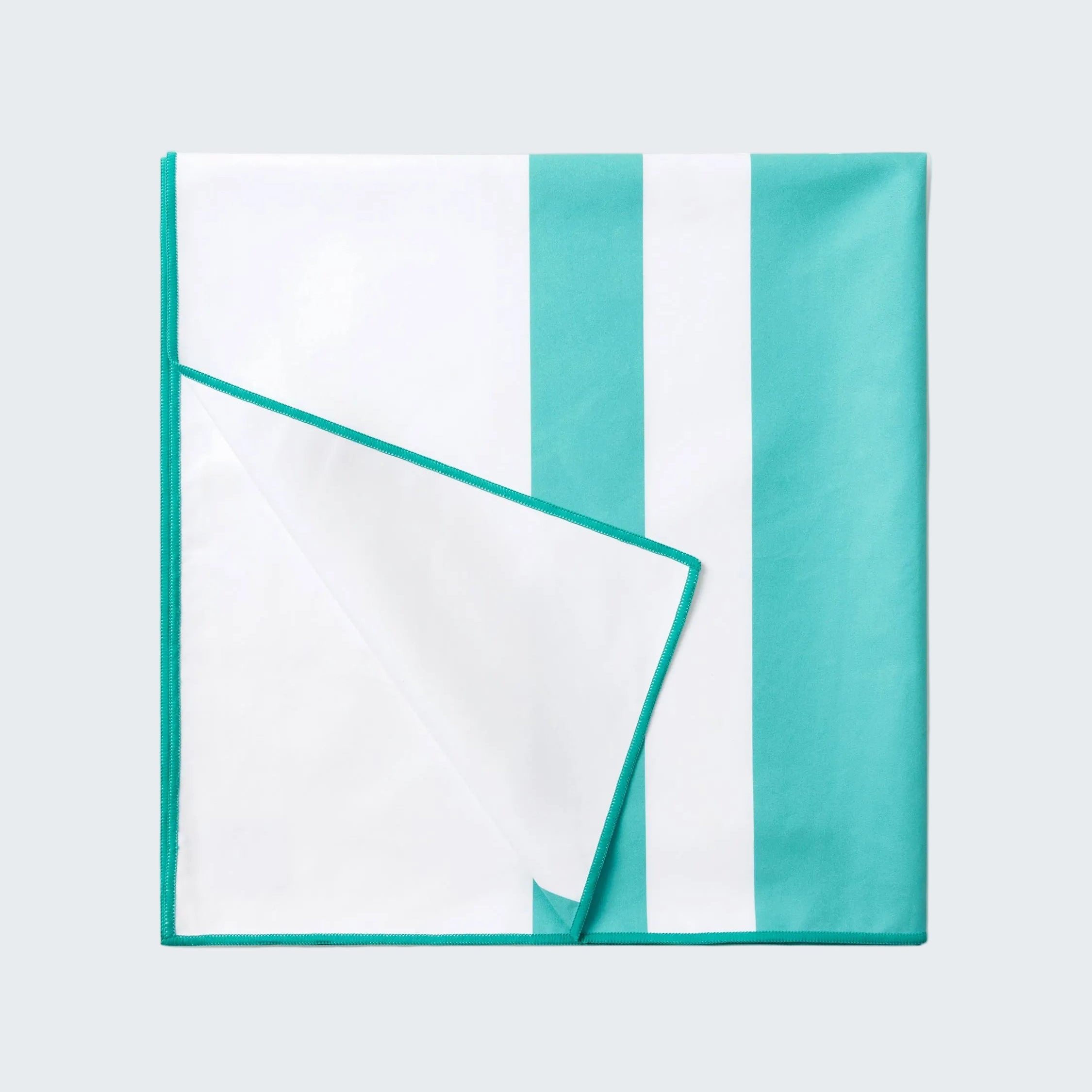 Teal and white striped fabric on a white background