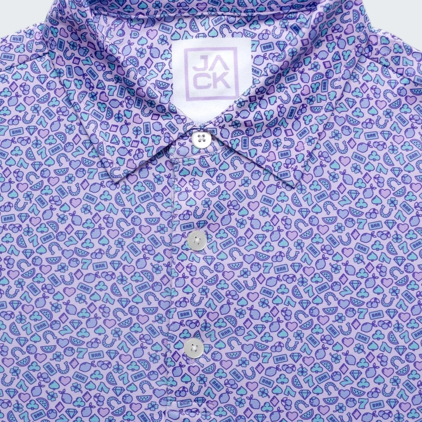 Close-up of a patterned shirt with a brand label on a white background