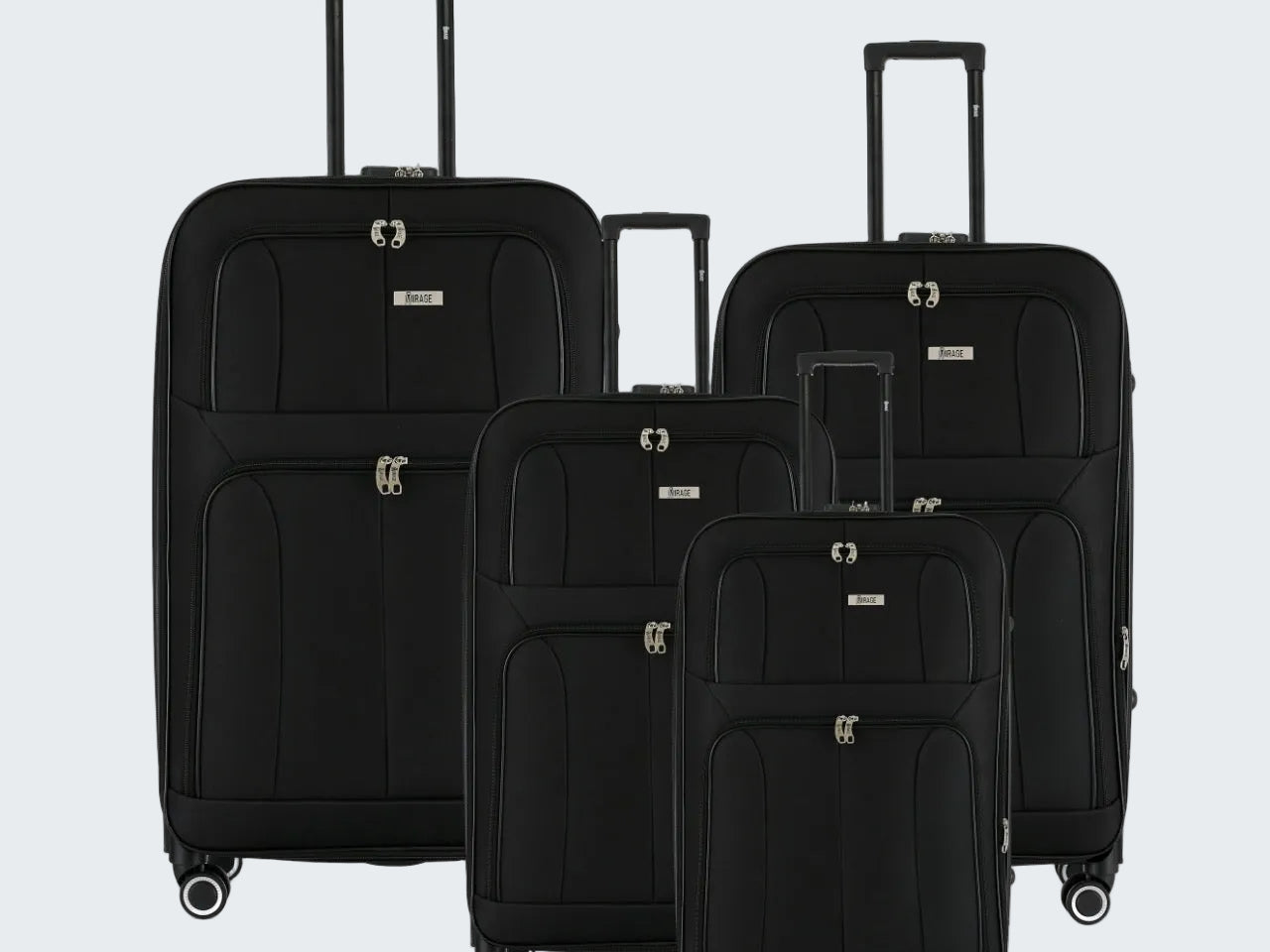 Set of black suitcases of different sizes on a white background