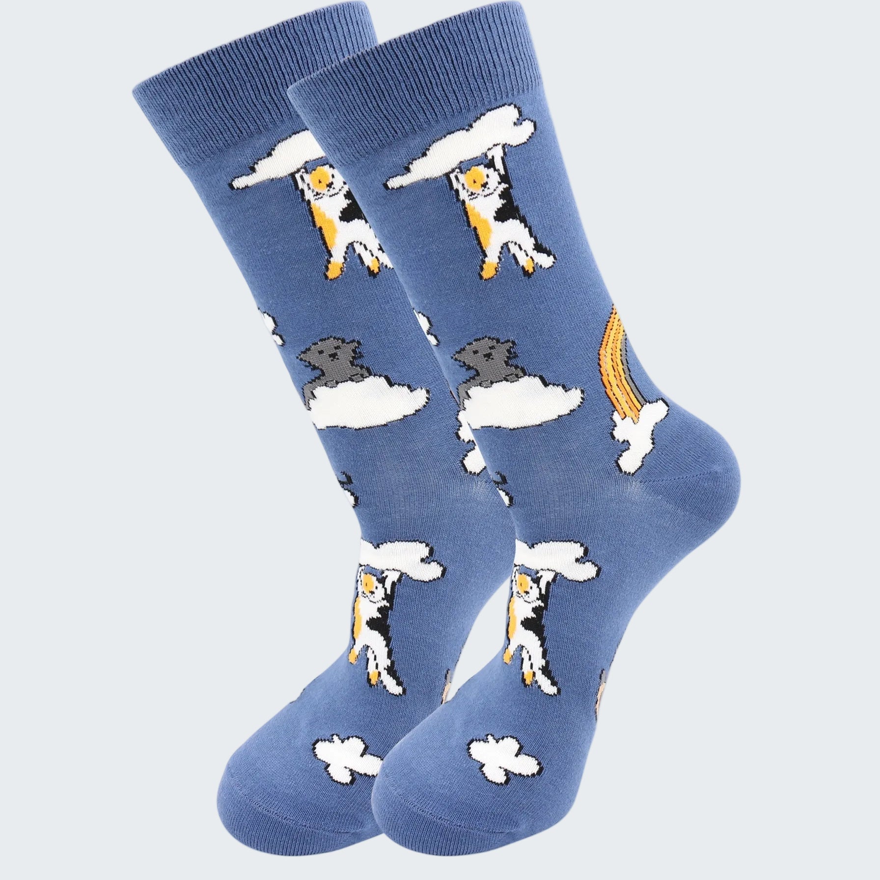 Blue socks with dog and cloud design on a white background