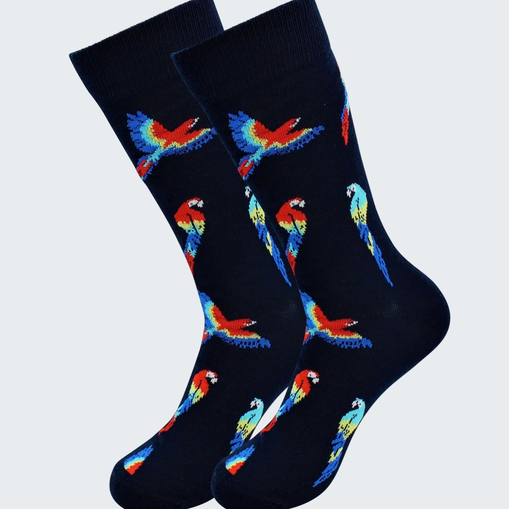 Pair of socks with colorful parrot design on a black background