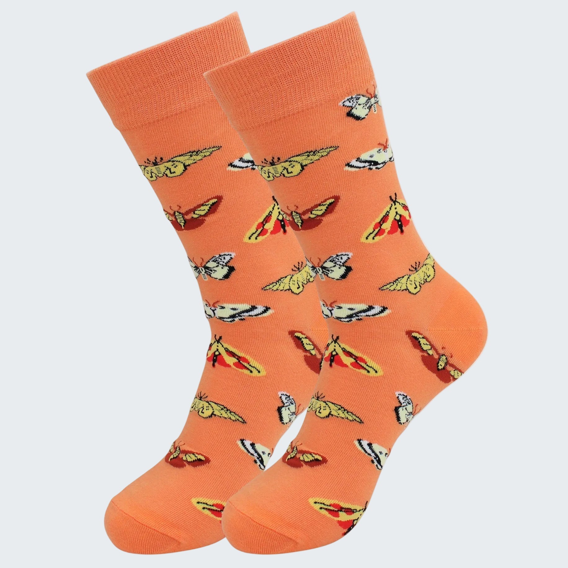 Orange socks with butterfly pattern on a white background