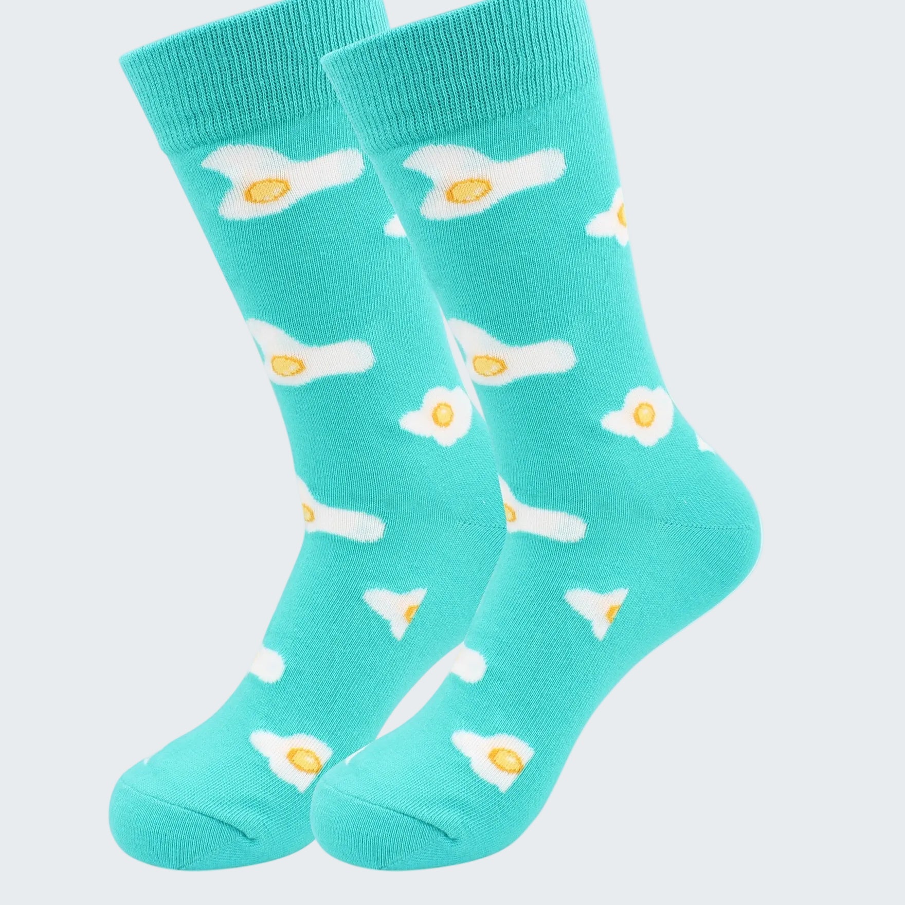 Turquoise socks with fried egg design on a white background