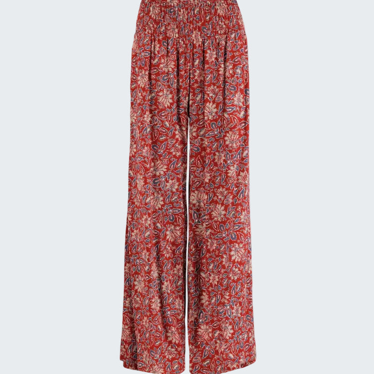 Red patterned pants on a white background