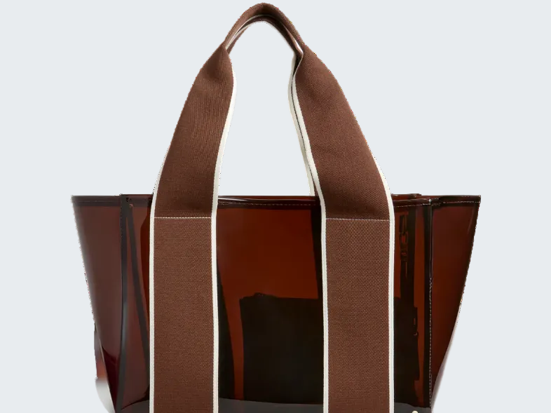 Brown tote bag with a glossy finish on a white background