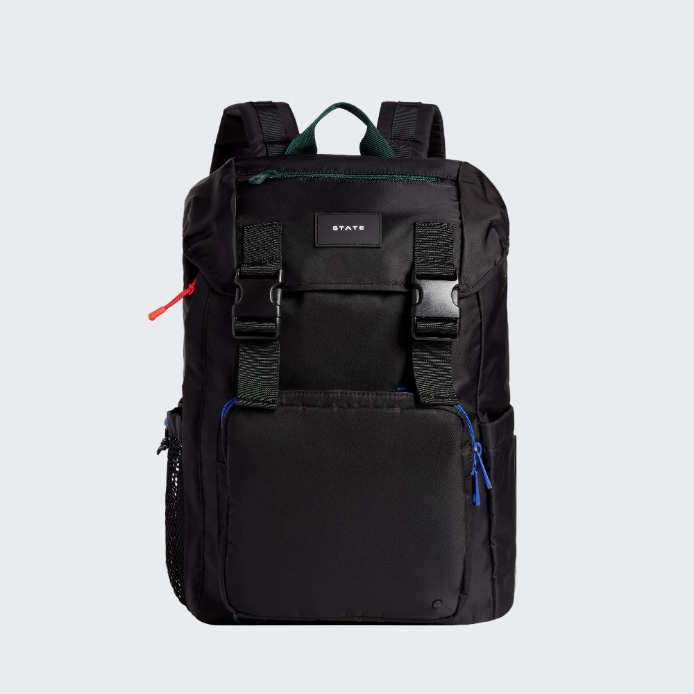 Black backpack with multiple pockets and straps on a white background