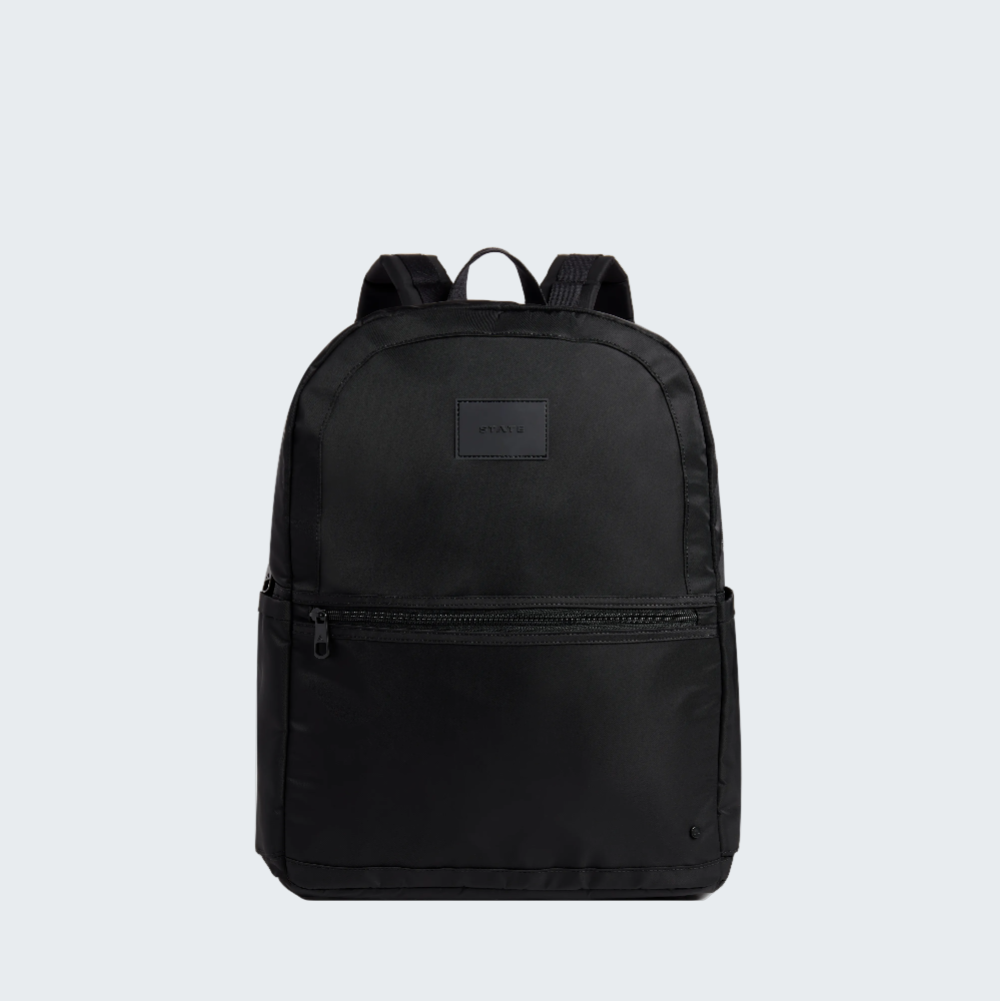 Black backpack with a visible brand logo on a white background