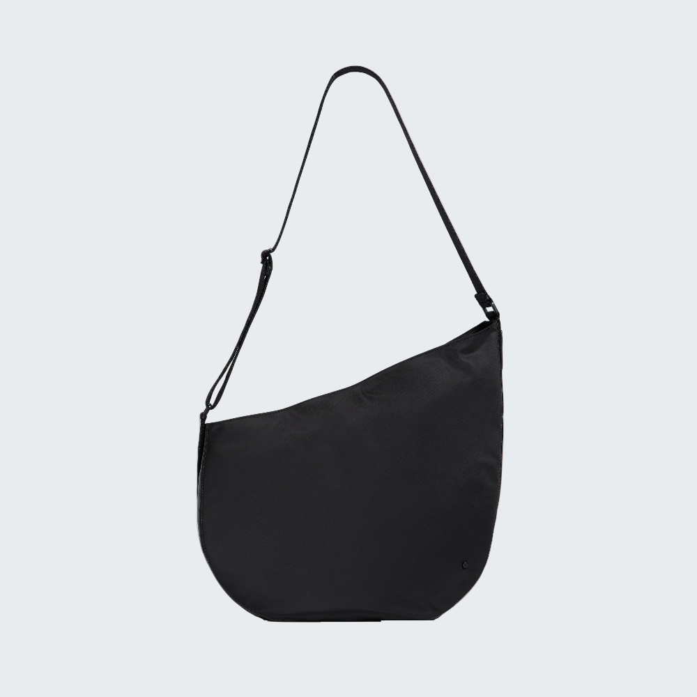 Black shoulder bag on a white background