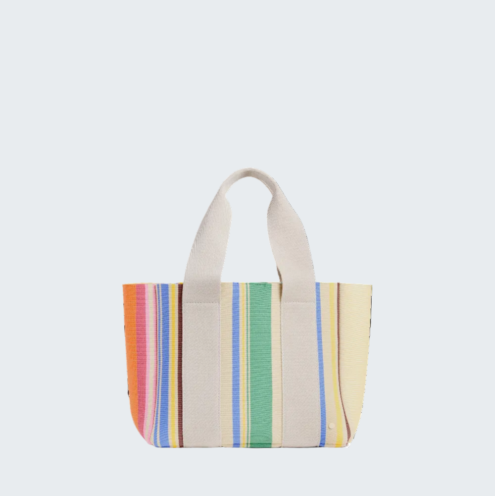 Tote bag with colorful striped pattern on a white background