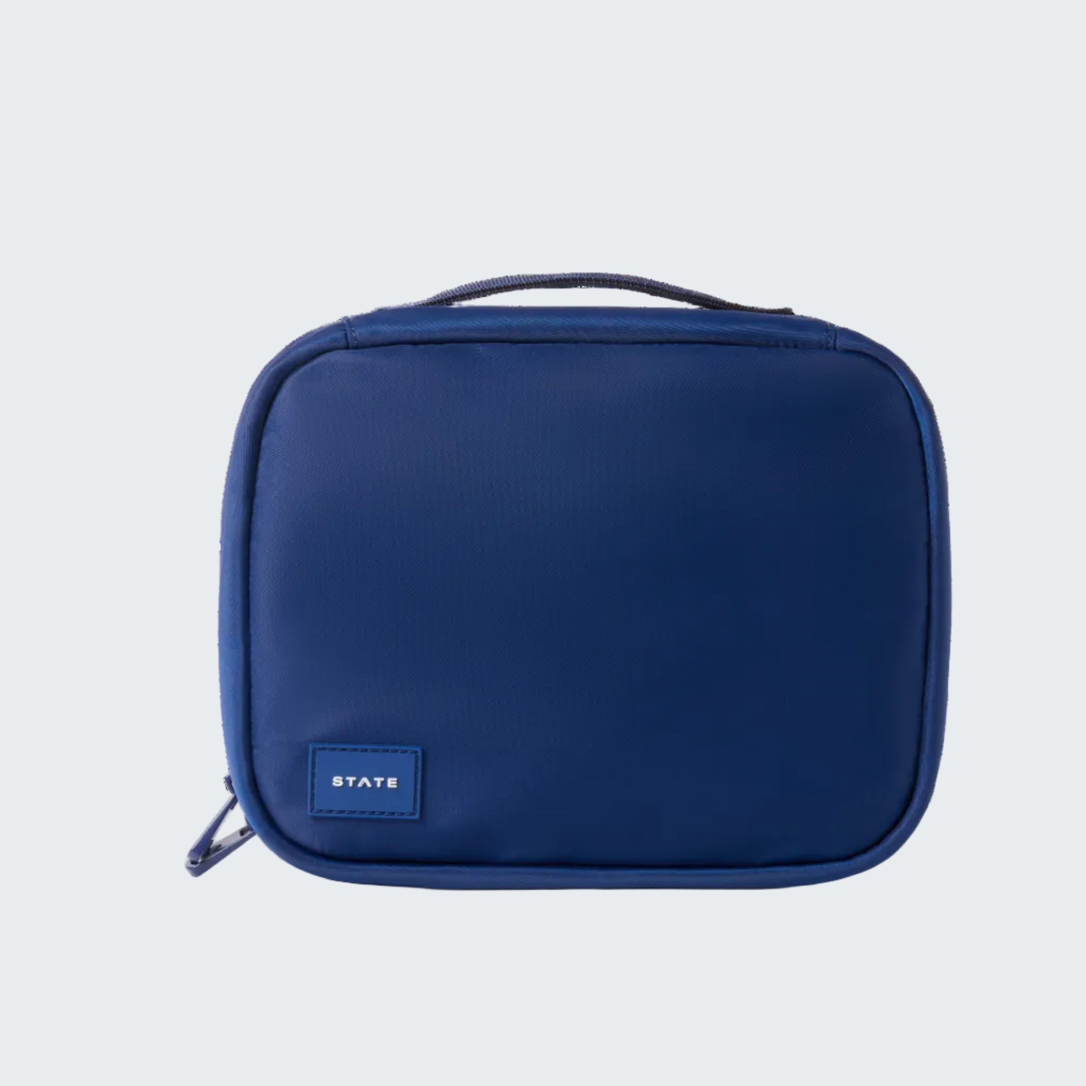 Blue toiletry bag with a visible brand logo on a white background