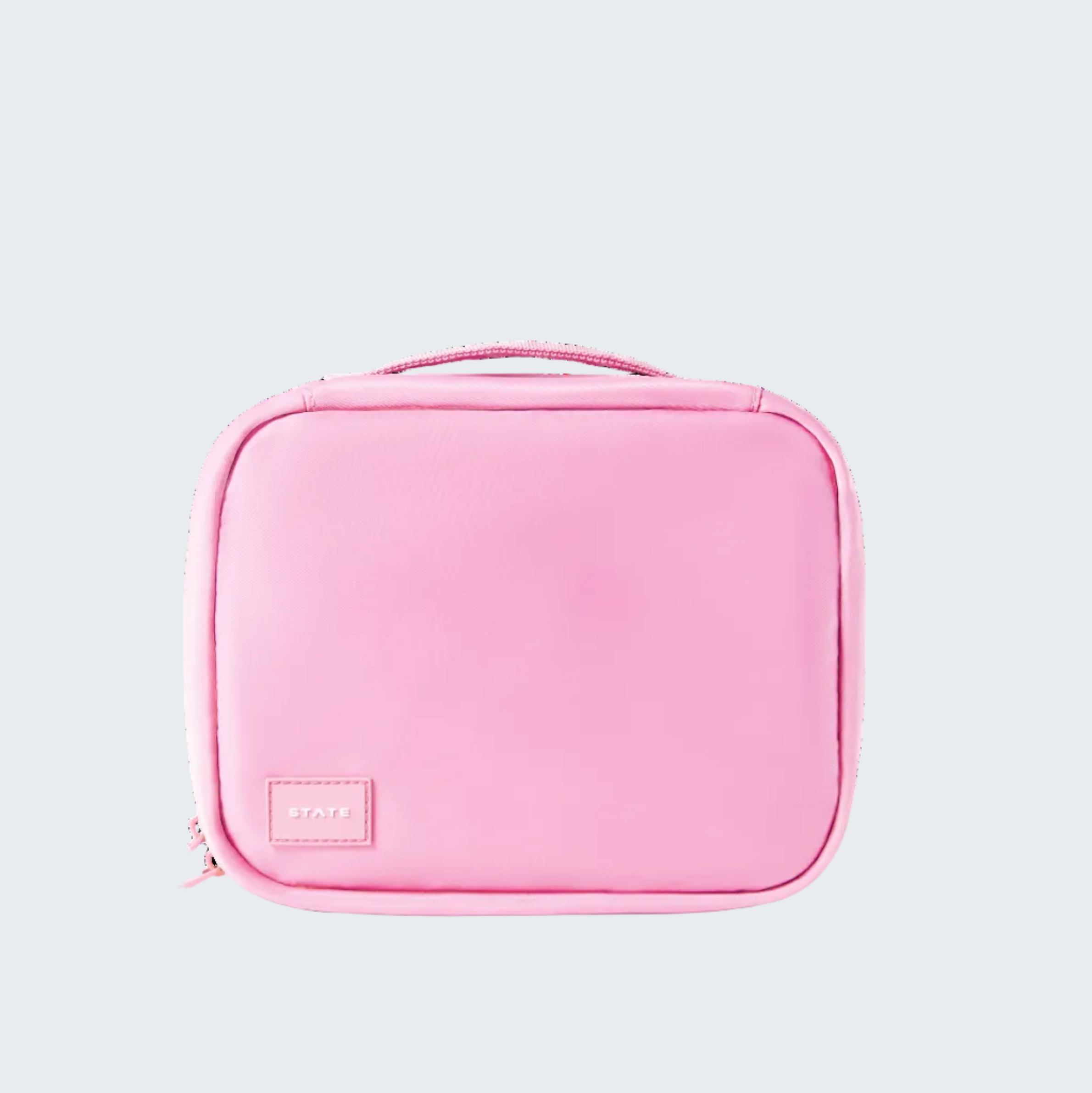 Pink toiletry bag on a white background