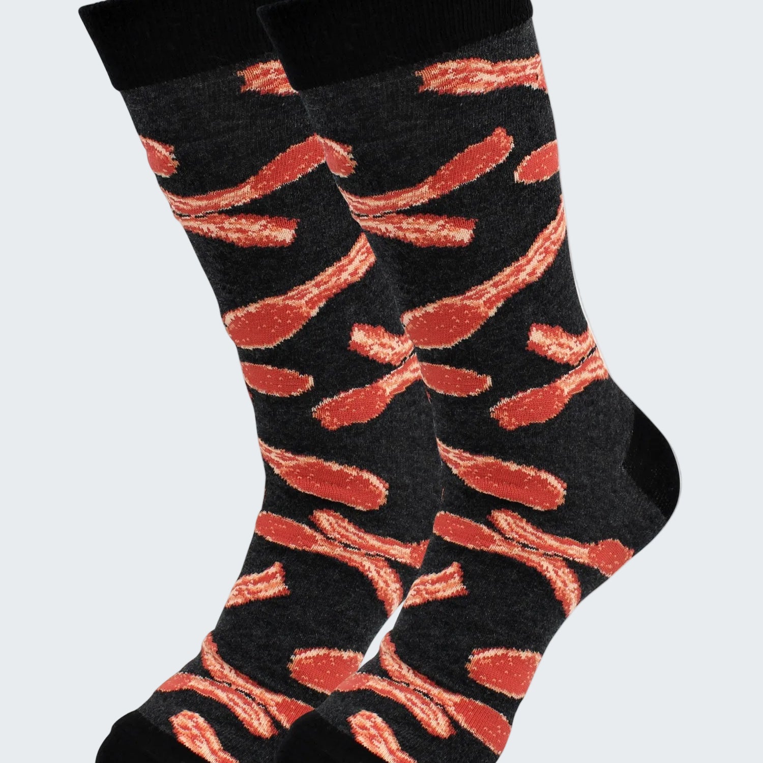 Black socks with red abstract pattern on a white background
