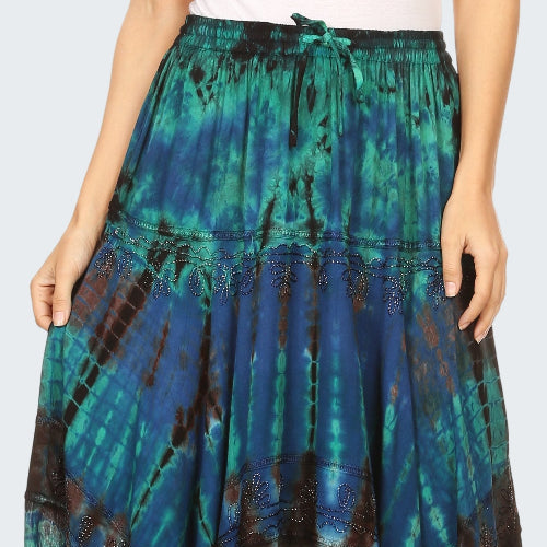 Tie-dye skirt with blue, green, and brown patterns on a white background