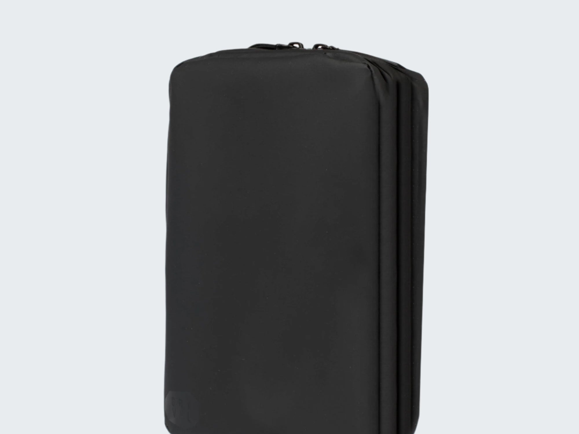 Black travel pouch on a white background