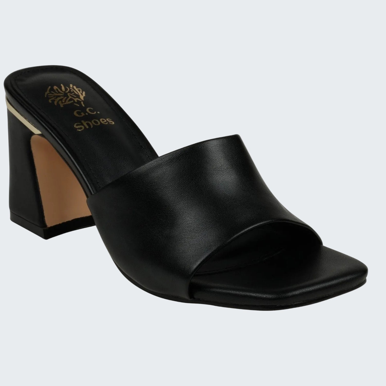 Black open-toe sandal with a block heel on a white background