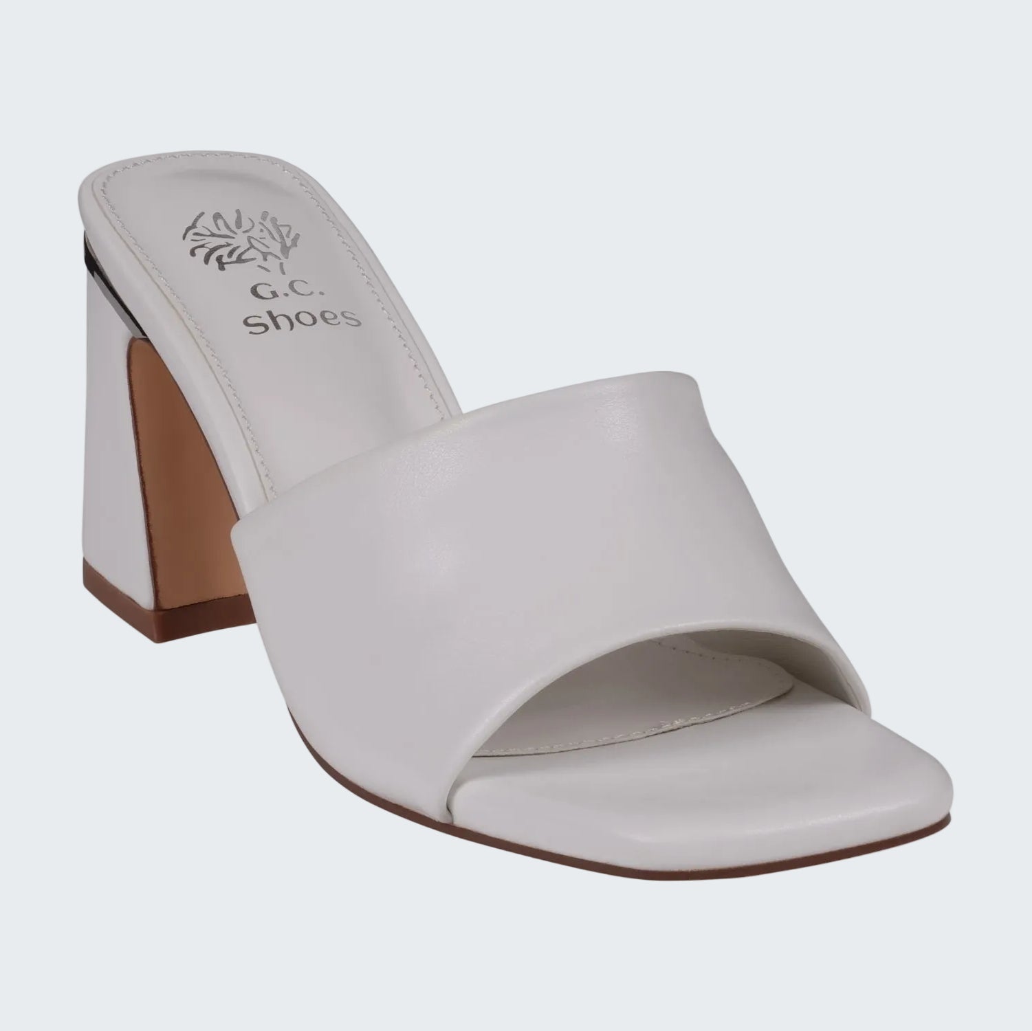 White sandal with a wooden heel on a white background