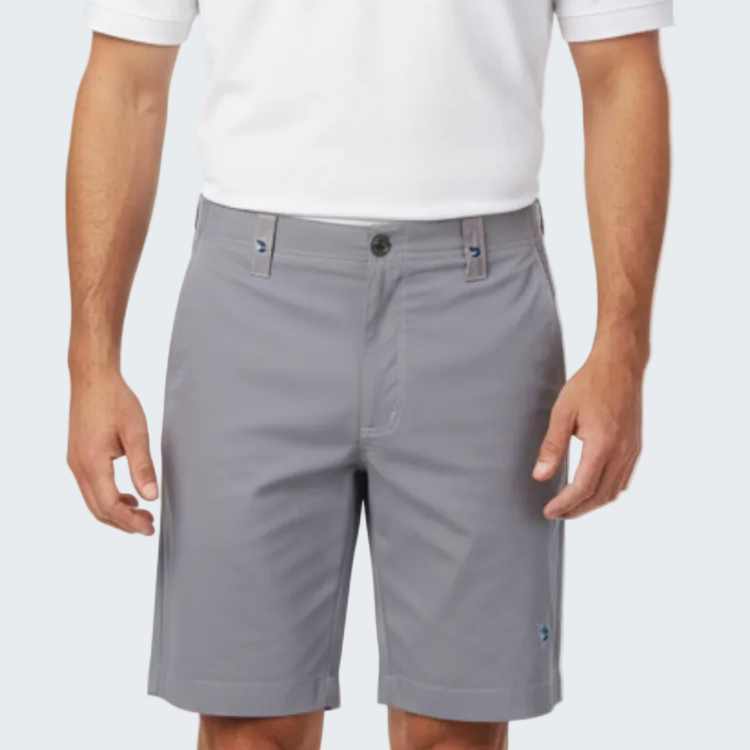 Person wearing gray shorts and a white shirt on a white background