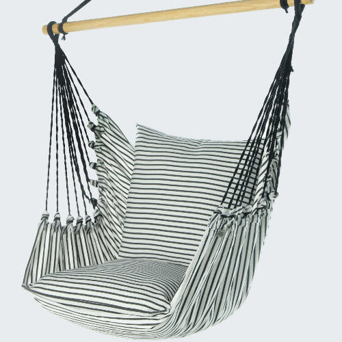 Striped hammock chair with wooden rod on a white background