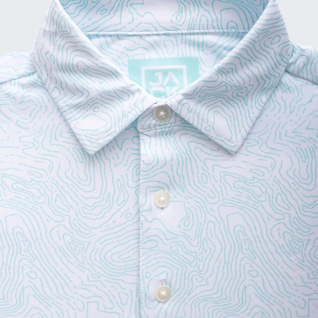 Light blue patterned shirt with a collar and buttons on a white background