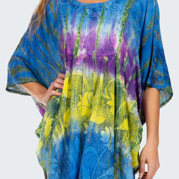 Tie-dye shirt with blue, purple, and yellow patterns on a white background