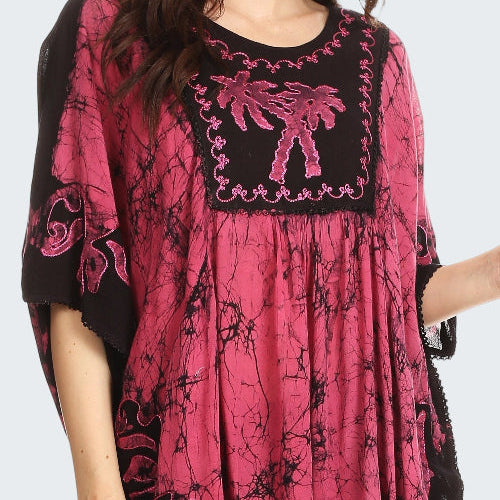 Pink and black patterned dress with a white background